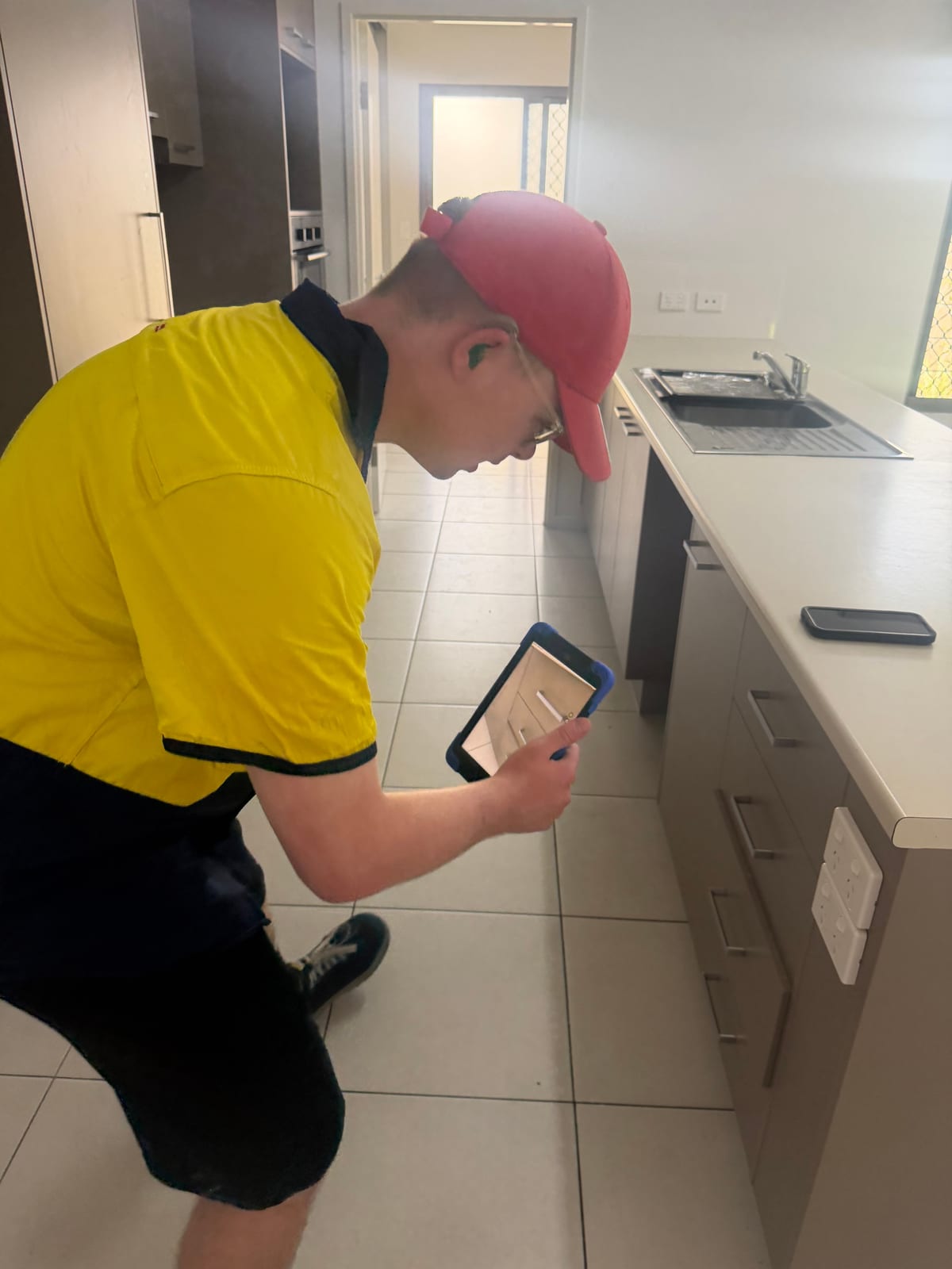 Participant getting organised in the kitchen at home with daily living support